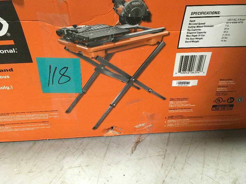 lot 118 image: RIDGID 7 in. Tile Saw with Stand in working conditions