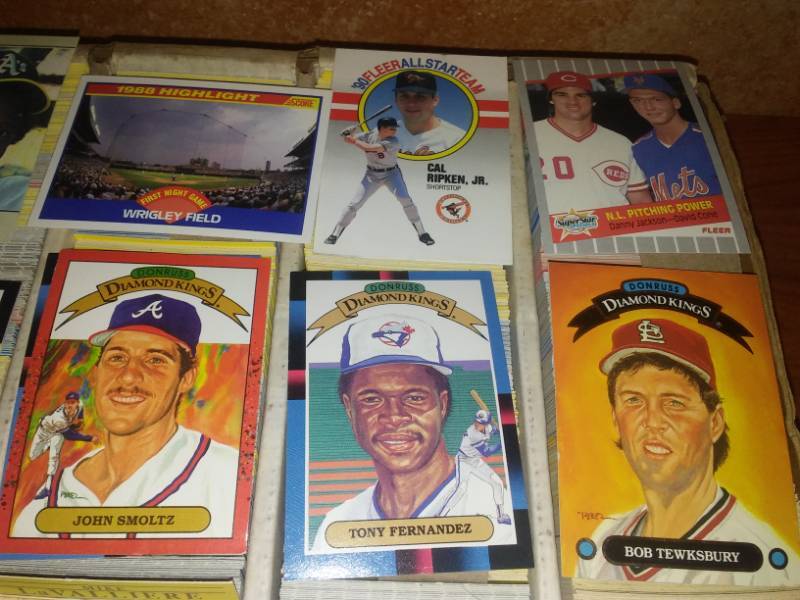 lot 48 image: 5000 MLB baseball cards sorted by team and 300 specialty cards, over 100 twins cards.