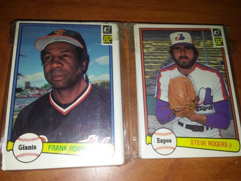 lot 79 image: 1982 MLB baseball cards. Early Donruss, Berra, Frank Robinson, Rafael Ramirez, Willie Randolph  180.