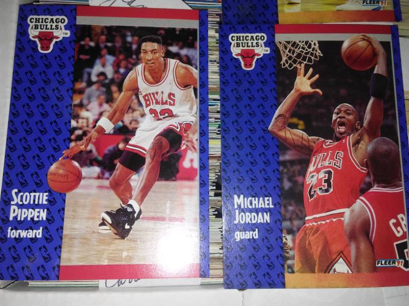 lot 108 image: 5000 cards, 4000 baseball by teams Reds shown. Celtics and Bulls shown. Jordan, Pippen, Bird, McHale, Parrish, Paxson