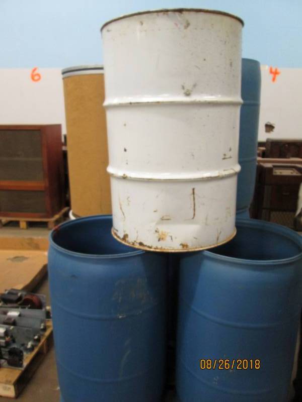 lot 27 image: 4-55 gallon plastic drums with lids...
