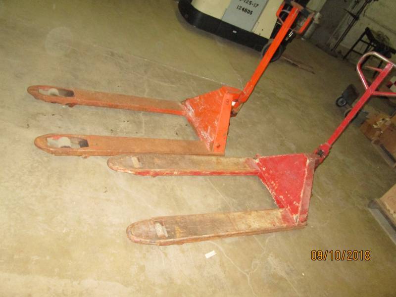 lot 45 image: 2 pallet jacks, both need hydraulic...