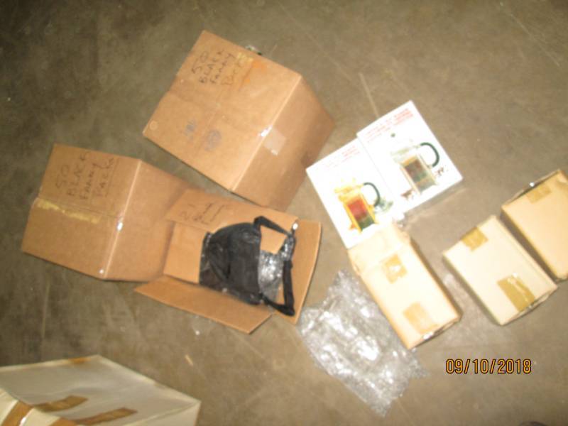 lot 57 image: Resale lot of fanny packs and coffe...