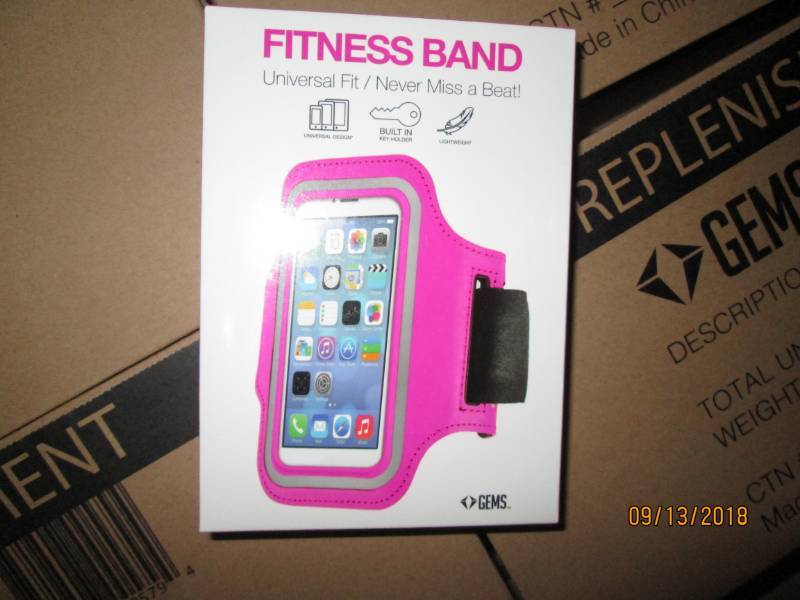 lot 312 image: Case of 48 Gems Fitness Bands wrist phone holders.  Pink