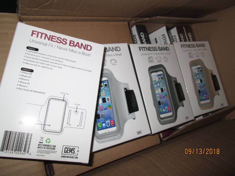 lot 313 image: Case of 48 Gems Fitness Bands wrist phone holders.  Mix of 4 metallic colors