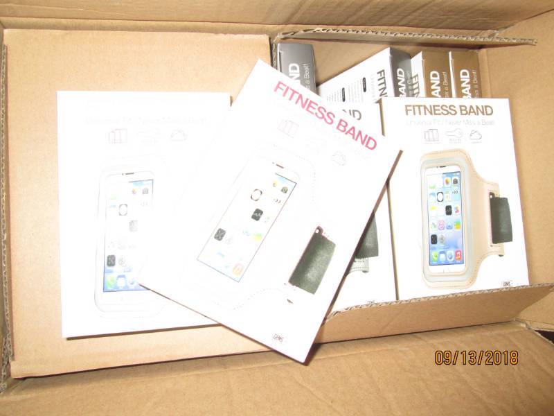 lot 315 image: Case of 48 Gems Fitness Bands wrist phone holders.  Mix of 4 metallic colors