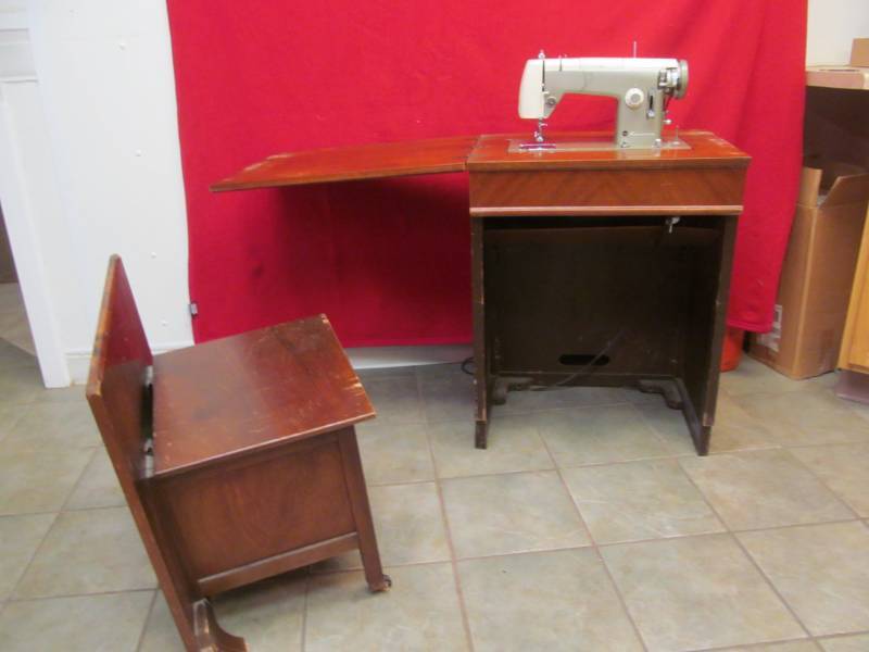 lot 29 image: vintage Kenmore sewing machine in cabinet