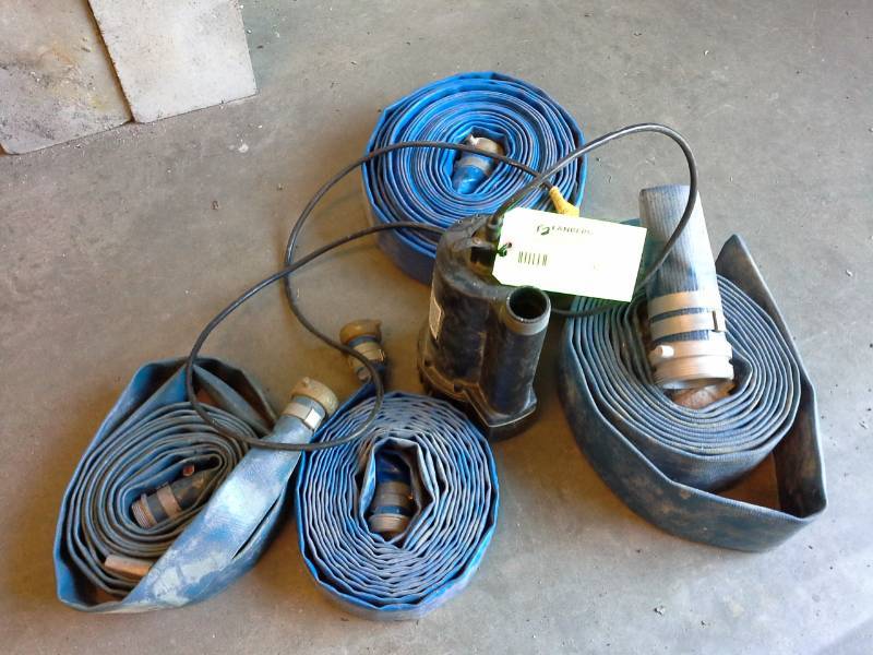 lot 92 image: Fire Hose lot and Submersible Pump