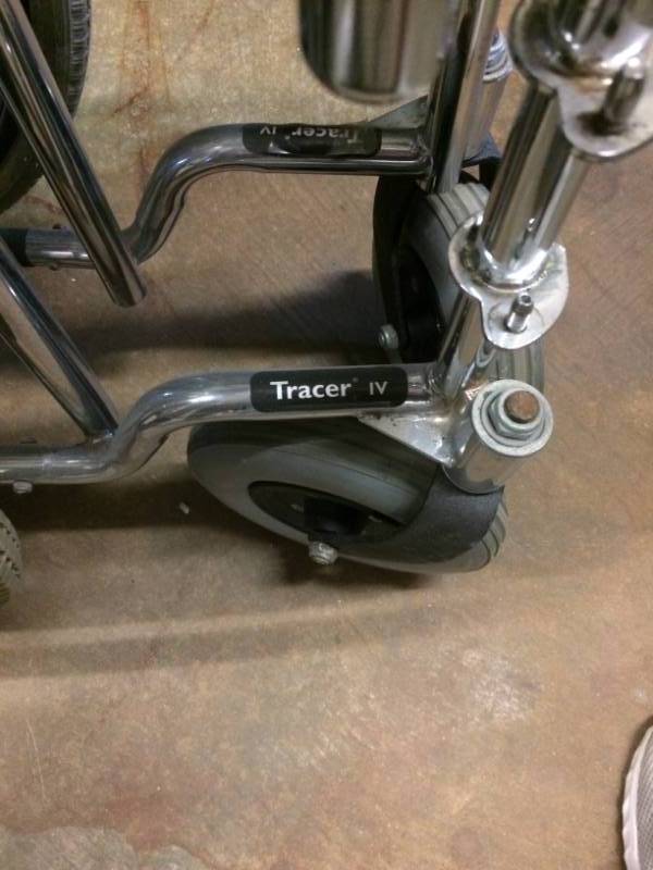 lot 19 image: Retails New $1500 INVACARE TRACER IV Heavy Duty Steel Gauge Bariatric Wheelchair - Excellent Condition Collapsible - 450 lbs Capacity