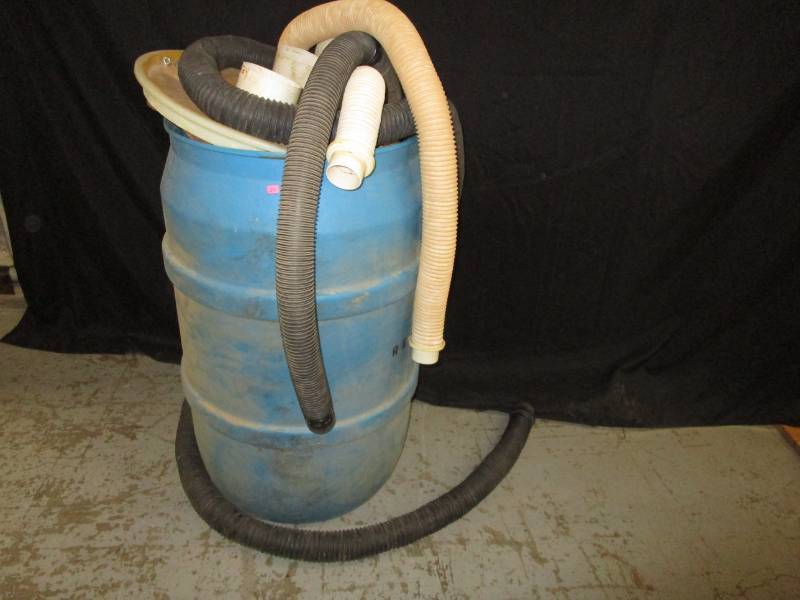 lot 24 image: Dust Collector Barrel With Hose