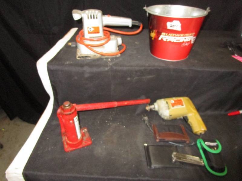 lot 73 image: Black and Decker Saw, Drill. Hydraulic Jack, Budweiser Bucket