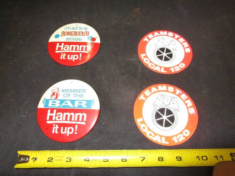 lot 106 image: 4 vintage Hamms Beer buttons