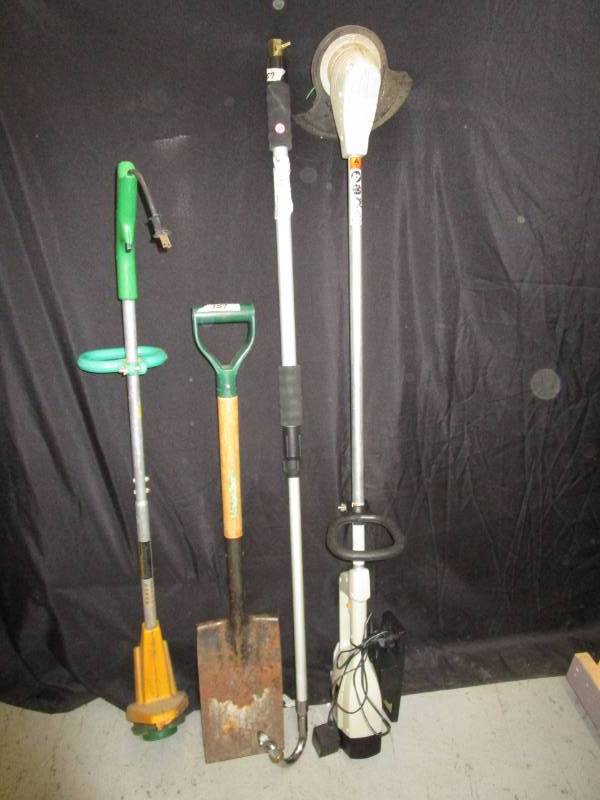 lot 137 image: cordless weed eater, telescoping wand with gutter cleaning attach.