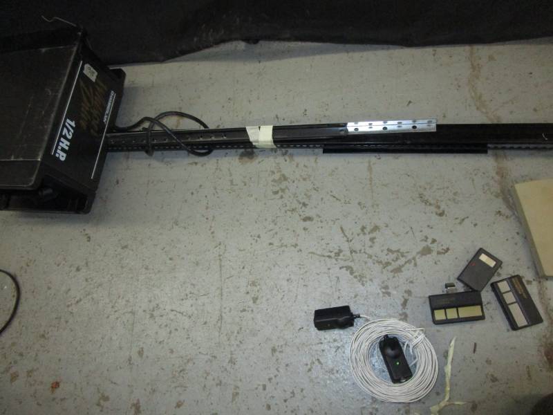 lot 151 image: Garage door opener  Chamberlain whisper drive  12 horse with remotes