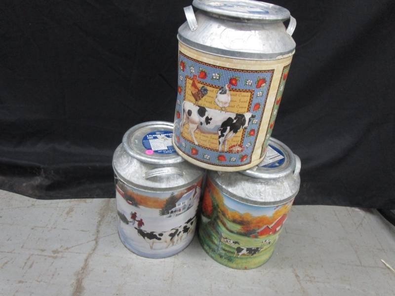 lot 157 image: 3 Tins that replicate cream cans, great for bird seed