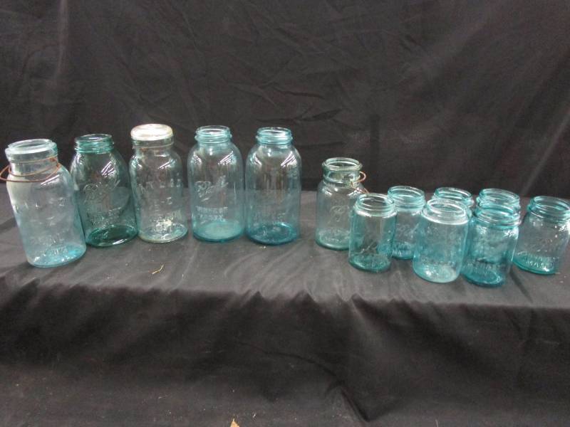 lot 165 image: Blue canning or decorative jars quart and pint
