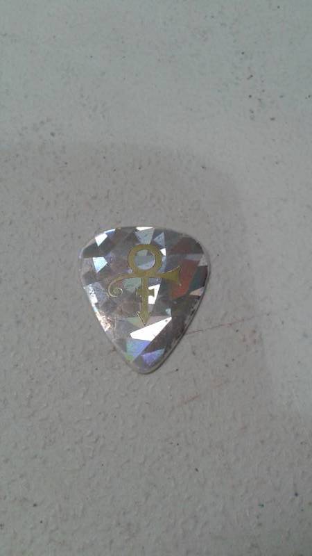 lot 41 image: Vintage Prince Tour Guitar Pick