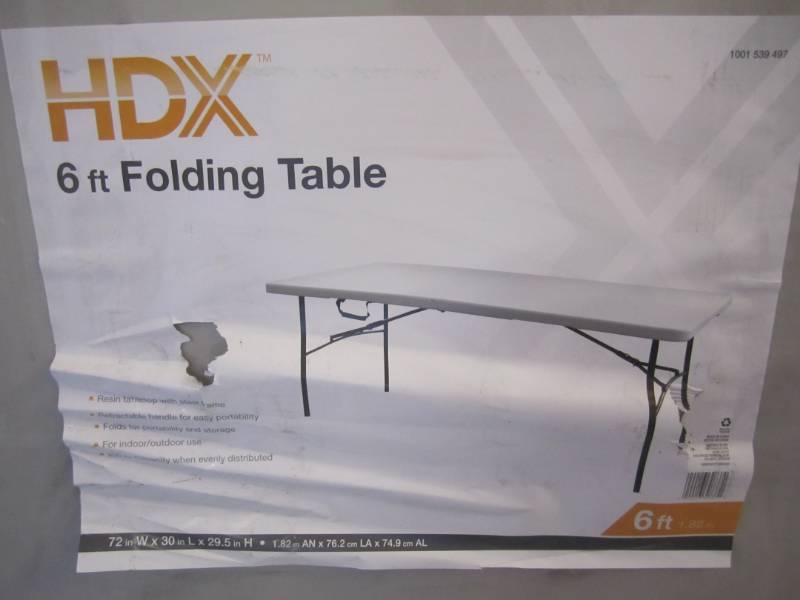 lot 13 image: HDX 6ft Portable Folding Table Reta...