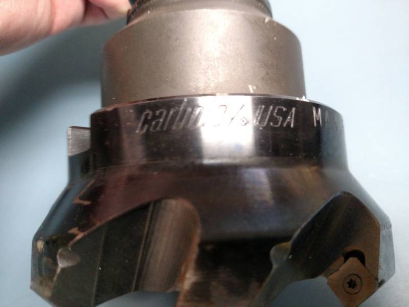 lot 85 image: BT35 Tool Holder with 4 Face Cutte...