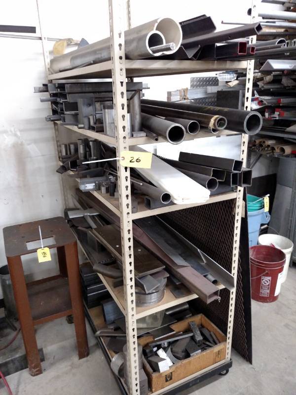 lot 26 image: Shelf with Assorted Metals Stock...