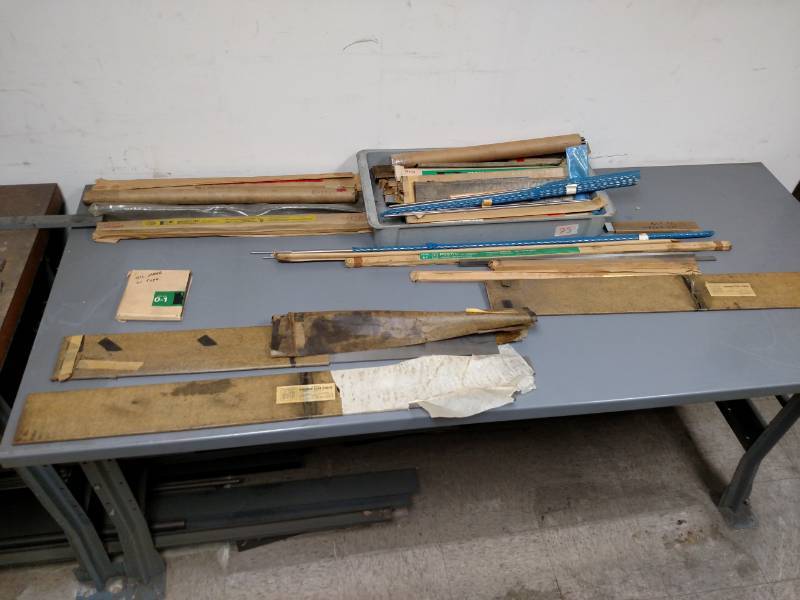 lot 28 image: (2) Work Benches with Assorted Meta...