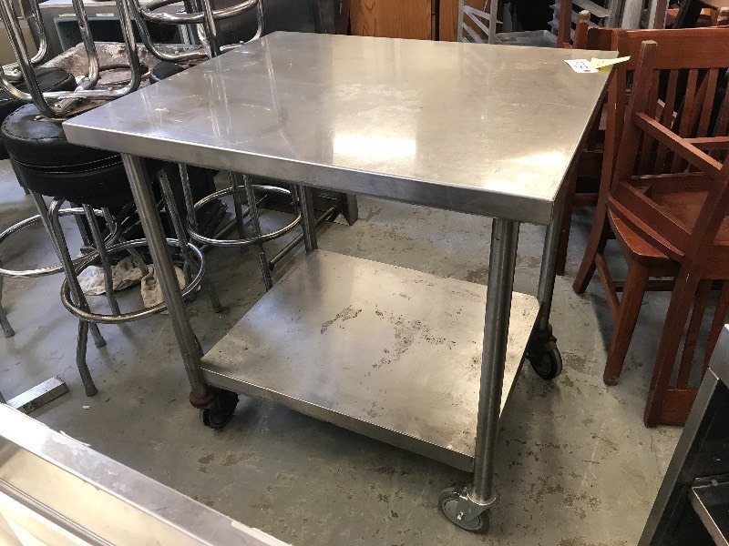 STAINLESS PREP TABLE ON WHEELS