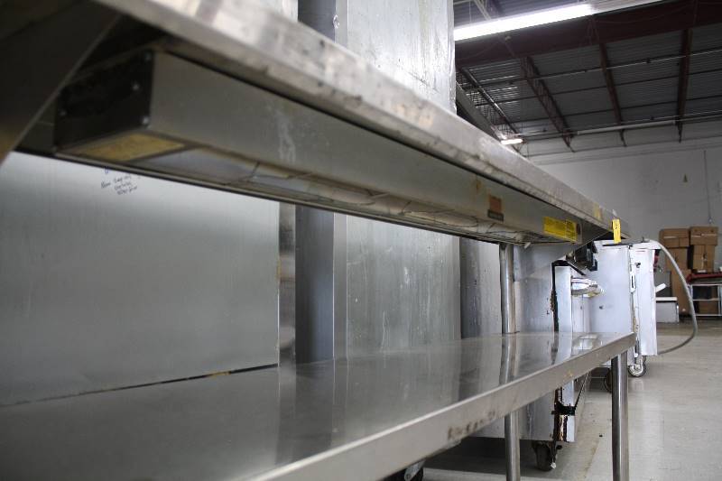 lot 49 image: Two Tier Shelf with two under the shelf heaters