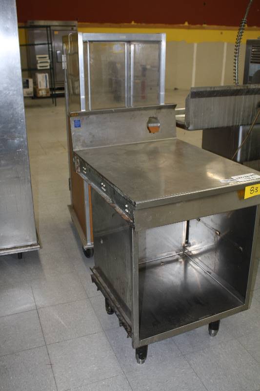 lot 83 image: Stainless Table 24x32x3514 with 8 backsplashUnfinished sides