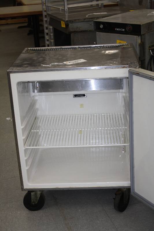 lot 24 image: Silver King 27in. Undercounter Refrigerator on Wheels, Model SKTTR-7, 115V, Runs Cools