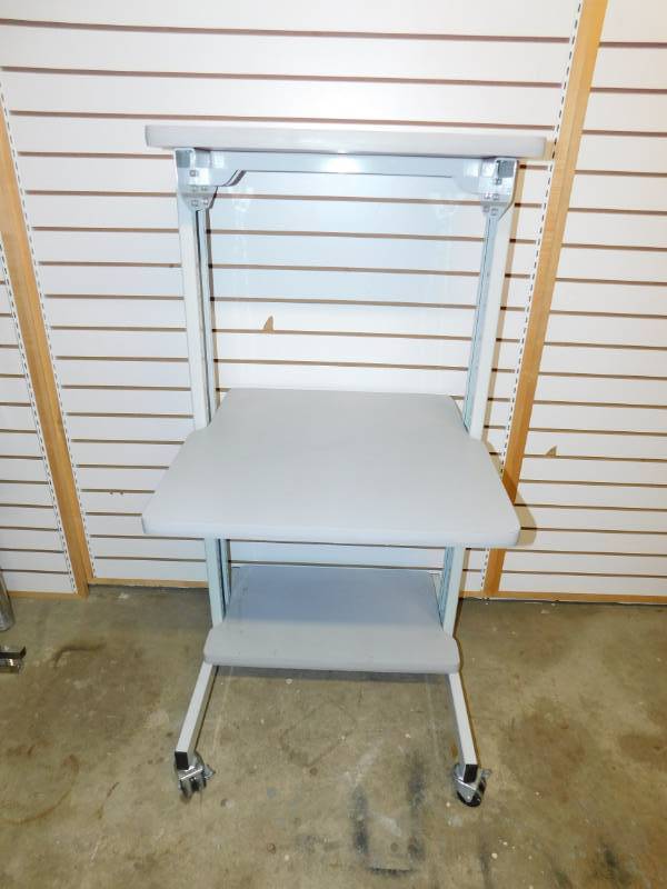 lot 28 image: Three Shelf Rolling Cart