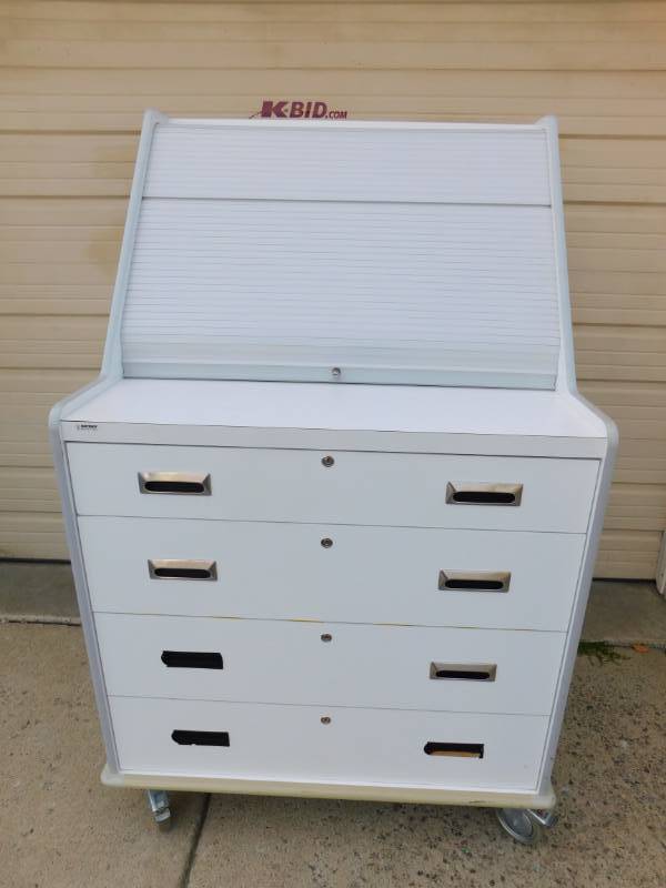 lot 57 image: White Medical Cart On Wheels
