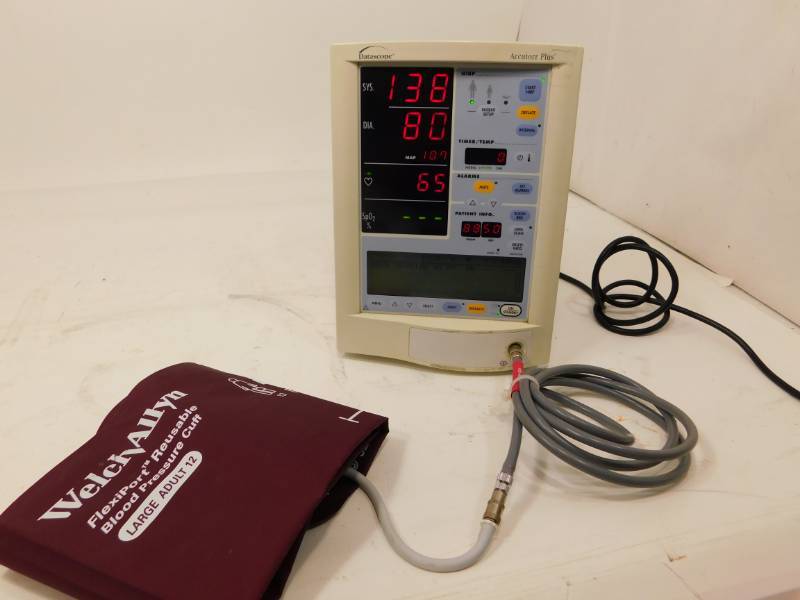 lot 65 image: Datascope Accutorr Plus Vital Signs Monitor & WelchAllyn FlexiPort Reusable Blood Pressure Cuff