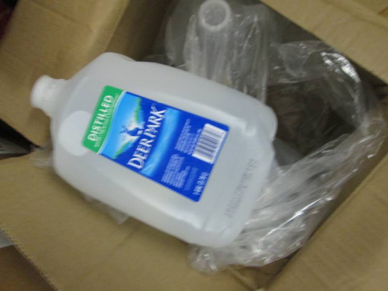 lot 127 image: 4 Gallons Distilled Water...