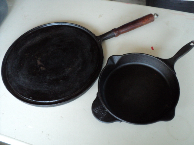 2 cast iron pans...