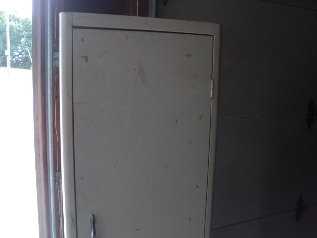 white metal cabinet 63 x 18 x 12...