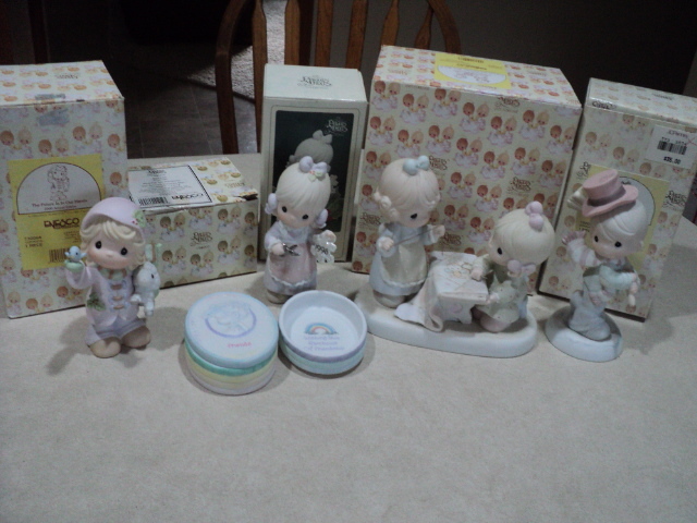 Precious Moments figurines with box...