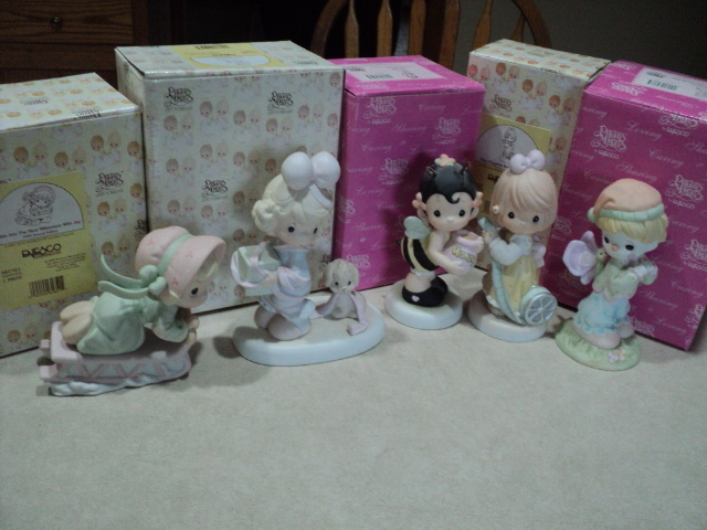 Precious Moments figurines with box...