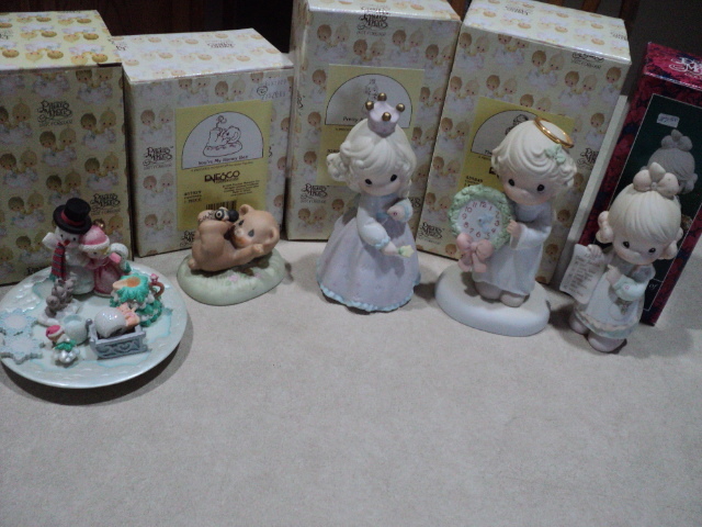 Precious Moments figurines with box...