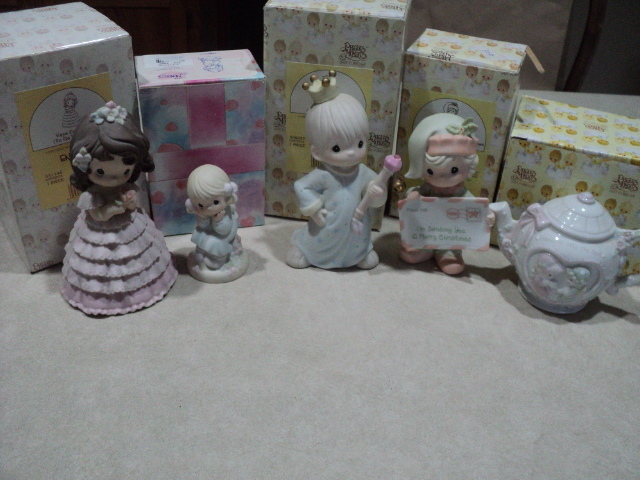 Precious Moments figurines with box...