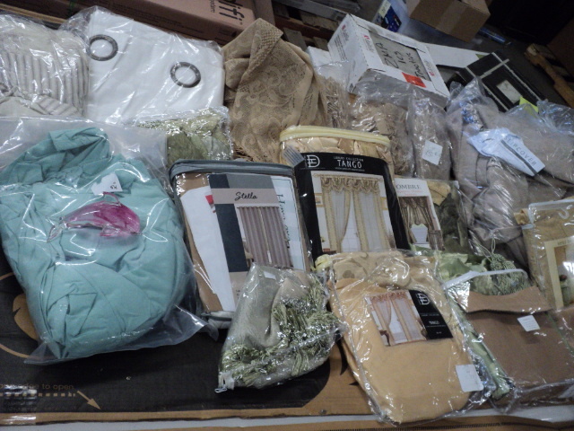 lot of drapery panels and chair cov...