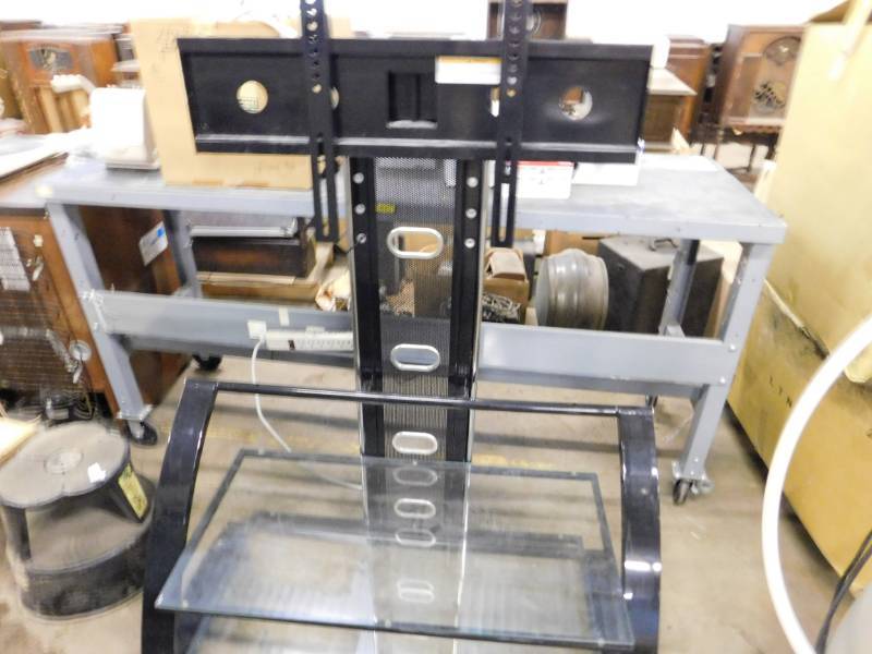 lot 21 image: Flat Screen TV Stand - 43(w) x 57(h) x 18(d)