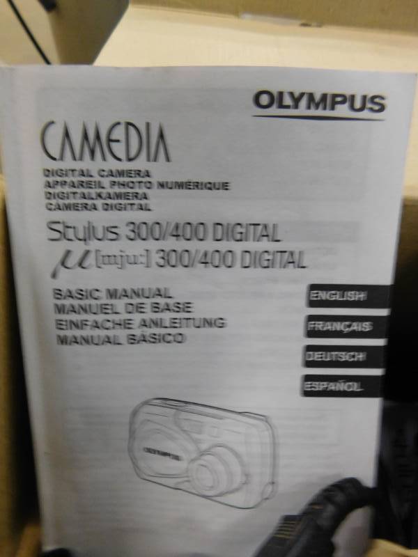 lot 22 image: Two Olympus Digital Cameras