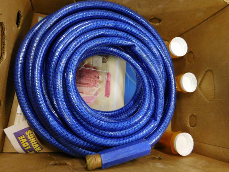 lot 217 image: Garden Hose & American Standard Kitchen Faucet