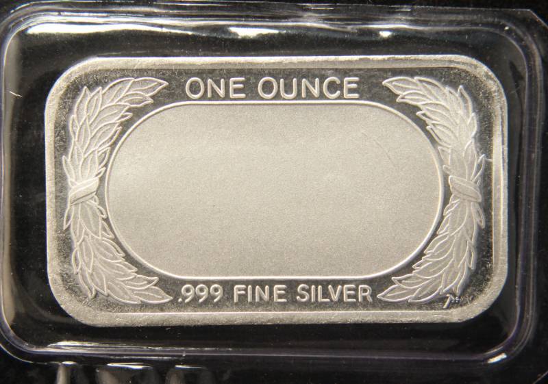 lot 11 image: 1 TROY OZ. .999 FINE SILVER BAR FLAG DESIGN SEALED