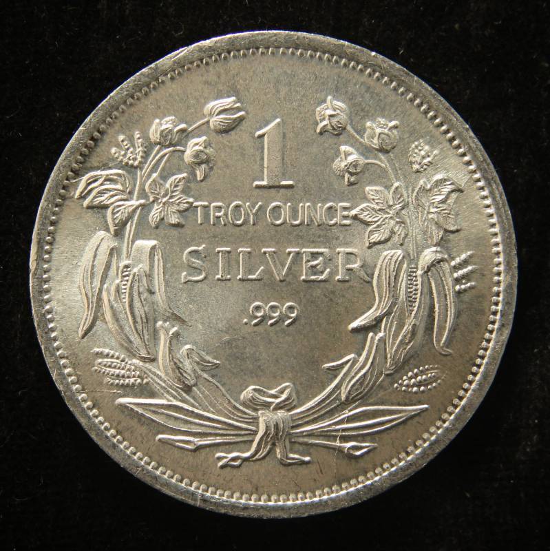 lot 18 image: 1 TROY OZ. .999 FINE SILVER SEATED DOLLAR DESIGN