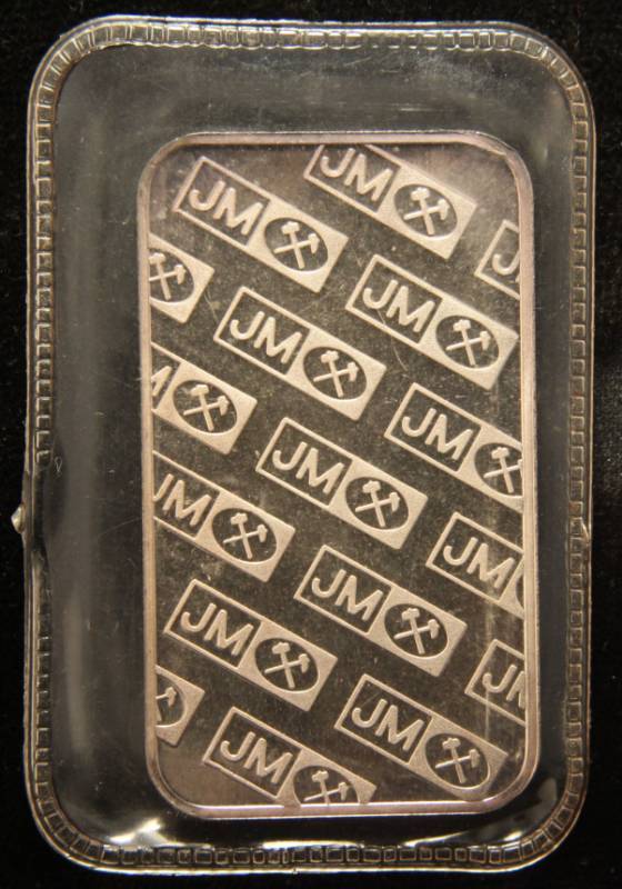 lot 36 image: 1 TROY OZ. .999 FINE SILVER BAR JM JOHNSON MATTHEY SEALED & TONED