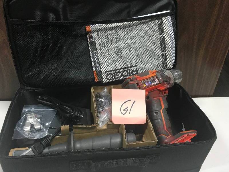 lot 61 image: Ridgid 18-Volt Lithium-Ion 12 in. Cordless Brushless Compact Hammer Drill Kit with (1) 2.0Ah Batteries, Charger and Bag in Good Condition