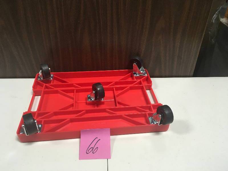 lot 66 image: Devault Enterprises 16 in. x 11 in. Multi-Purpose Red Garage Dolly in Good Condition