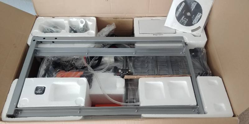 lot 9 image: Ridgid 7 Wet Tile Saw with Stand