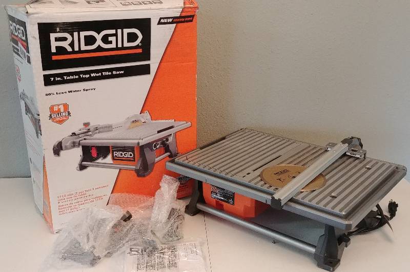 lot 30 image: Ridgid 7 Table Top Wet Tile Saw